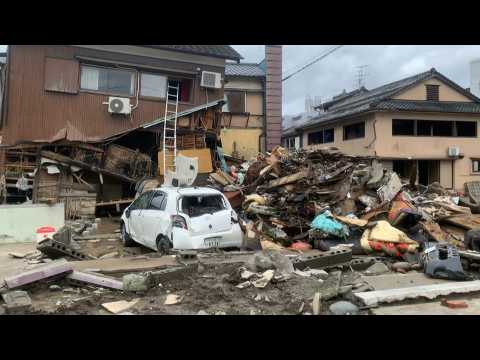 Destruction and debris on streets after deadly floods in Japan