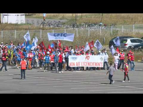 Thousands of employees protest Airbus job cuts