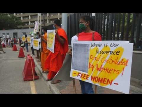 Activists protest in Sri Lanka after stranded migrant workers in Middle East die from covid-19