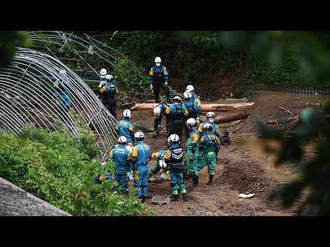 Rescuers in Japan search for survivors following deadly floods