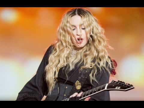 Madonna confirms plans to go back on tour