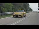 Toyota GR Supra in Yellow Driving on the road