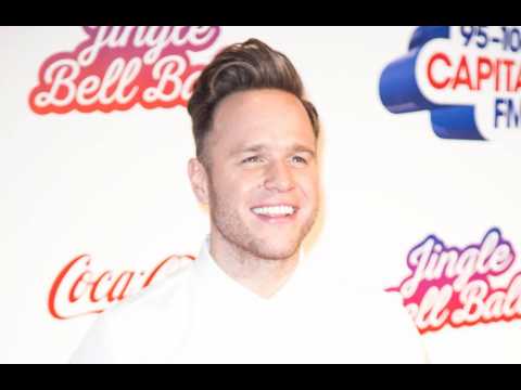 Olly Murs dressed up as Kylie Minogue for Robbie Williams on tour