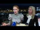 Britain's Emily Beecham reacts after winning best actress