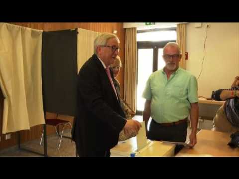 JEAN-CLAUDE JUNCKER AND ANTONIO TAJANI VOTE IN EU ELECTIONS