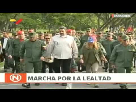 Venezuela's Maduro takes part in military parade