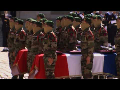 Funeral caskets of fallen French soldiers arrive at Invalides