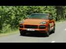 The new Porsche Cayenne Turbo Coupé in lava orange Driving Video