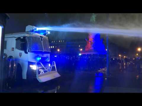 Police use water cannon at Paris protest against security law