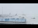 US: Workers plow snow at Boston airport amid East Cost winter storm