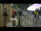 Passengers at Madrid airport as EU mulls blocking UK flights over new virus strain