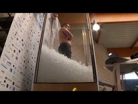 Up to his neck in it: 'Ice man' sets immersion world record in France