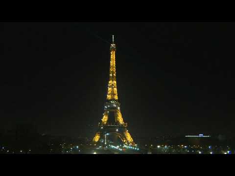 The Eiffel Tower sparkles for the New Year amid France curfew