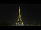 The Eiffel Tower sparkles for the New Year amid France curfew