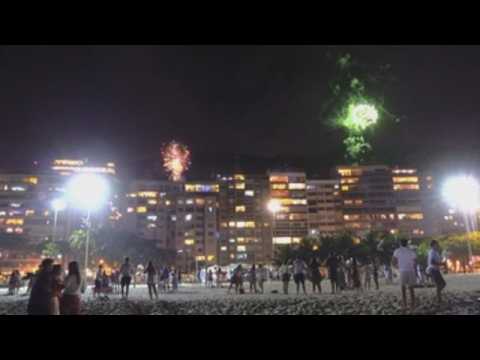Brazilians celebrate New Year on beaches despite cancellation of usual beach party due to pandemic