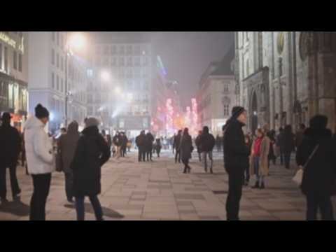 Austrians celebrate New Year's eve on streets of Vienna despite nationwide lockdown