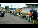 People line up to refill empty oxygen tanks as stock runs short in northern Brazil