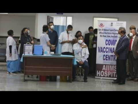 India's Minister of Health is vaccinated against covid in New Delhi