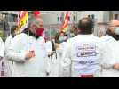 Sanofi employees protest outside lab in Vitry-sur-Seine