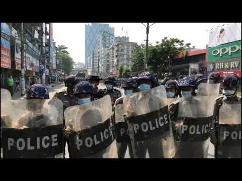 Riot police face off against protesters in Myanmar anti-coup protest