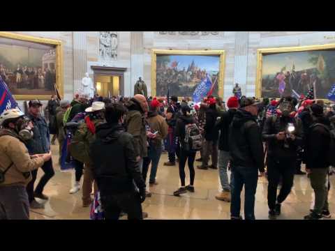 Supporters of US President Donald Trump enter the US Capitol