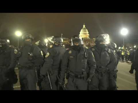 Chaotic scenes outside US Capitol as police kettle protesters after curfew