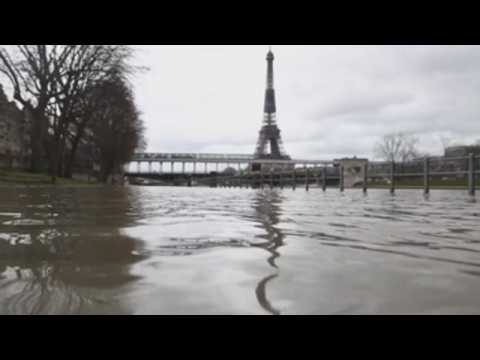 Heavy rains overflow the Seine River near the Eiffel Tower