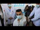 Palestinian health workers in Bethlehem get vaccinated against COVID