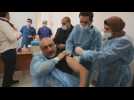 Health workers get coronavirus vaccine in Dura, West Bank