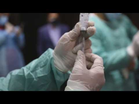 Health personnel get coronavirus vaccine in the West Bank