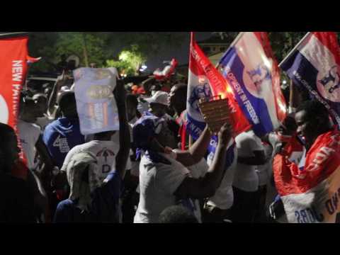 Ghanaian supporters of President Nana Akufo-Addo celebrate re-election
