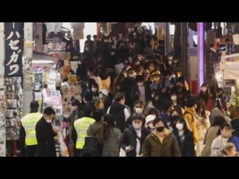 Japan sets single-day record with more than 3,000 new cases