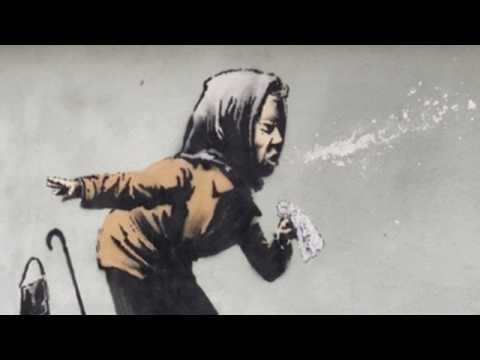 Banksy mural of woman sneezing appears in Bristol
