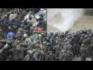 Guatemala police fire tear gas at US-bound migrant caravan