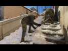 Army helps clear of snow streets of Toledo, Spain