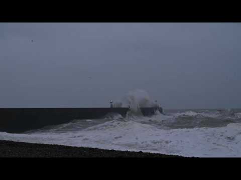 Waves crash over Newhaven Lighthouse as Storm Bella batters Britain