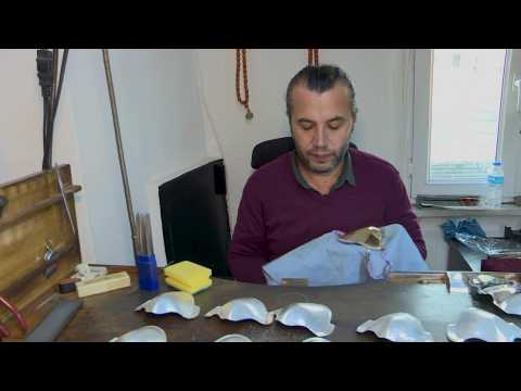 Turkish craftsman makes gold and silver face masks