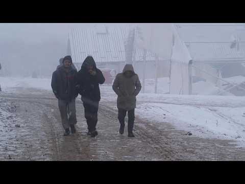 Bosnia migrants 'moved into heated tents' amid more snowy weather
