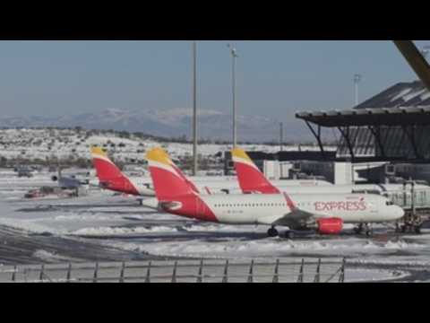 Madrid airport gradually reopens after storm hits Spain