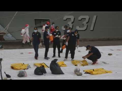 Indonesia seeks to recover crashed plane's black boxes