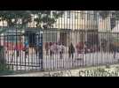 Greek children return to school after long confinement