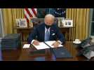 Biden signs series of orders, including to rejoin Paris climate accords