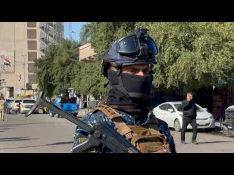 Security forces at site of rare suicide attack in central Baghdad