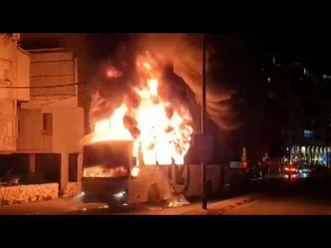 Israeli Haredis torch bus amid heightened lockdown tensions