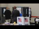 Democrat Raphael Warnock casts his vote on the first day of early voting in Georgia