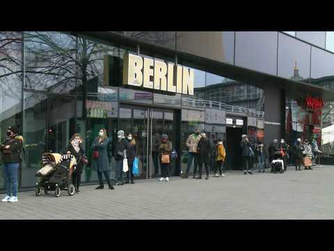 Berliners rush to non-essential shops before they close