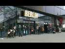 Berliners rush to non-essential shops before they close
