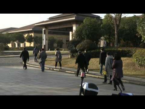 Chinese officials arrive for meeting with the WHO in Wuhan