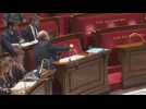 French justice Minister using an offensive hand gesture in Parliament