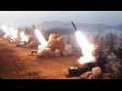 Kim Jong Un supervises North Korean troops simulating attack on South